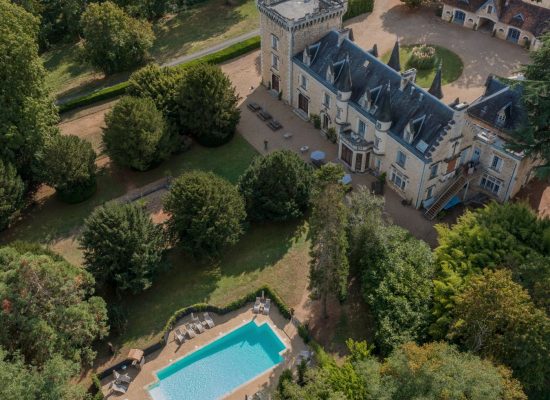 Poolside reception setup at Château de la Couronne, perfect for outdoor wedding celebrations.