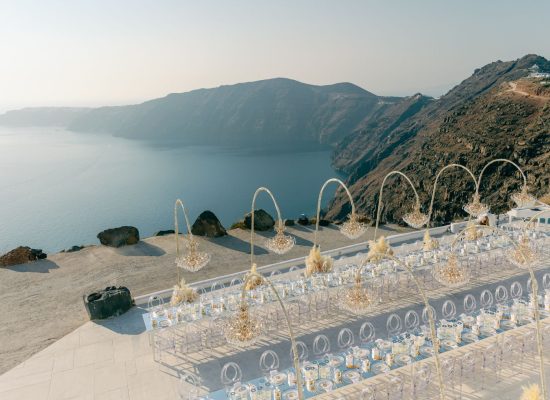 Cliffside view of Rocabella Santorini with sweeping views of the Aegean Sea, ideal for destination weddings.