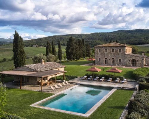 Poolside area at Rosewood Castiglion del Bosco, perfect for relaxation and enjoying the Tuscan sun.