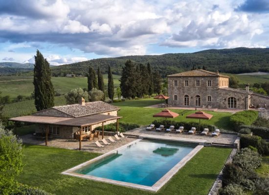 Poolside area at Rosewood Castiglion del Bosco, perfect for relaxation and enjoying the Tuscan sun.