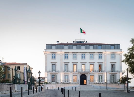 Stunning front view of Verride Palácio Santa Catarina in Lisbon, Portugal, with historic architectural elegance and lush greenery.